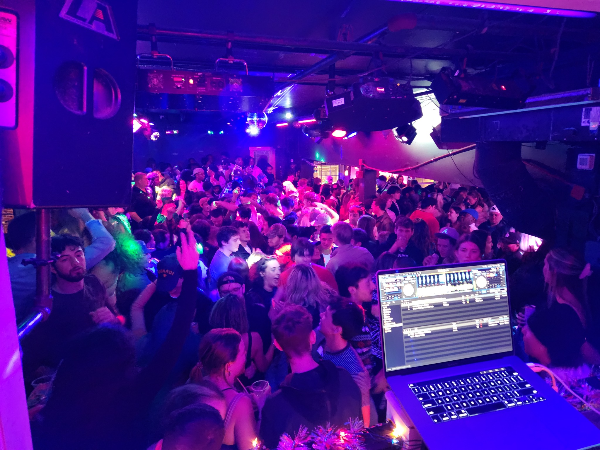 Packed nightclub dance floor